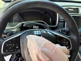 2021 Honda CR-V Hybrid Touring - Interior Steering Wheel With Keys Image